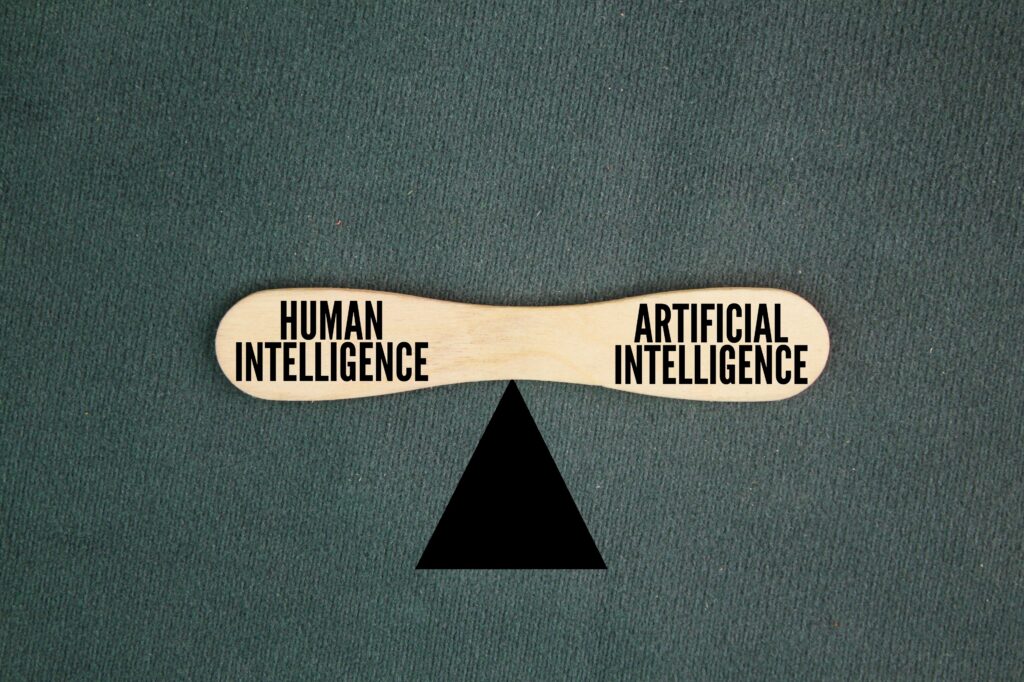 the,balance,between,the,words,human,intelligence,vs.,artificial,intelligence.